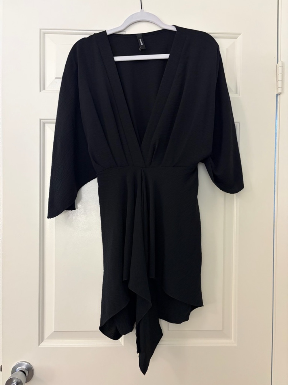 Black Mini Dress with Deep V-Neck and Draped Hem